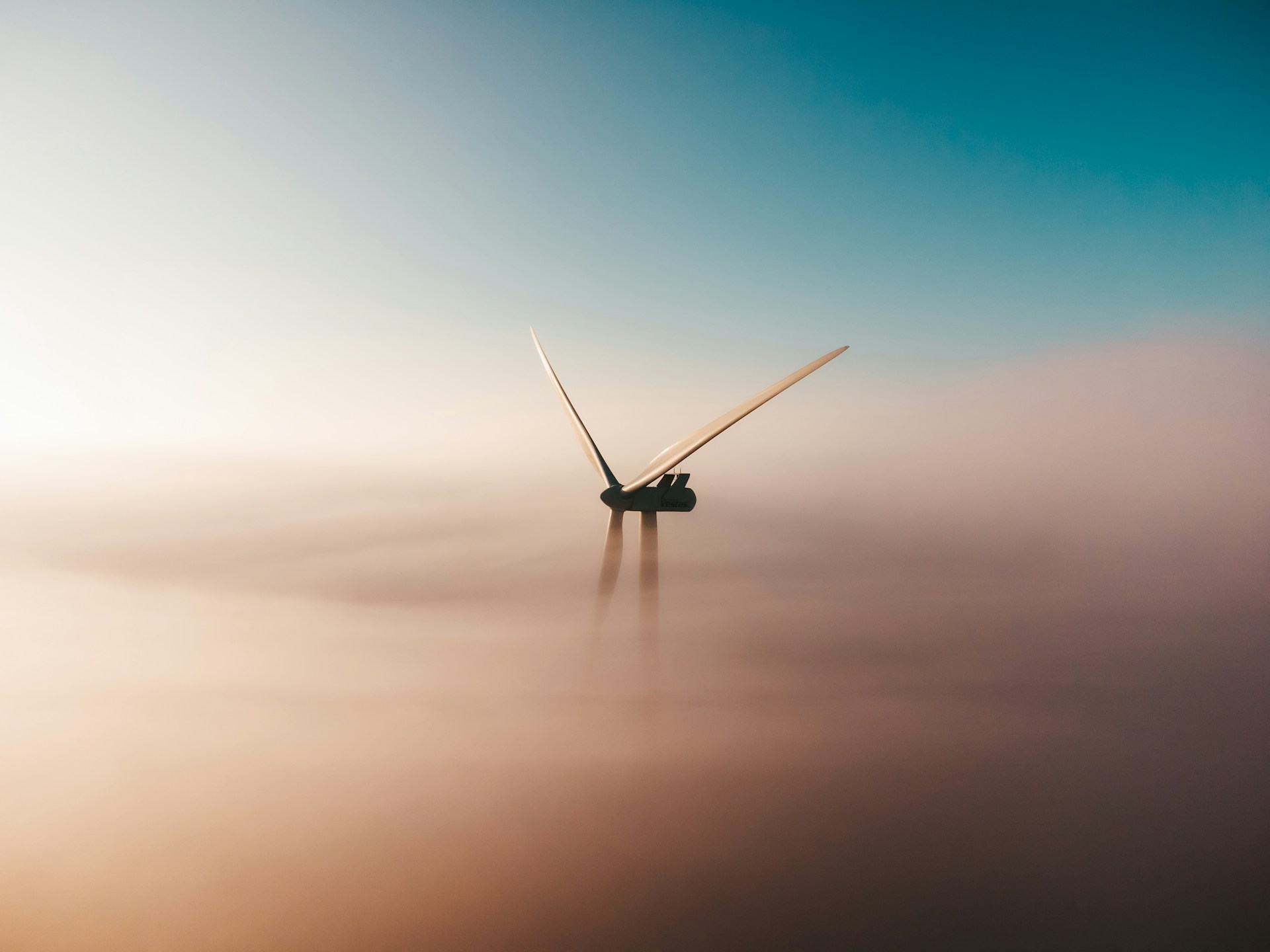 Photo by <a href="https://unsplash.com/@sanderweeteling?utm_source=unsplash&utm_medium=referral&utm_content=creditCopyText">Sander Weeteling</a> on <a href="https://unsplash.com/photos/wind-turbine-emerging-from-fog-at-sunrise-iGDg_f_mlWo?utm_source=unsplash&utm_medium=referral&utm_content=creditCopyText">Unsplash</a>
      