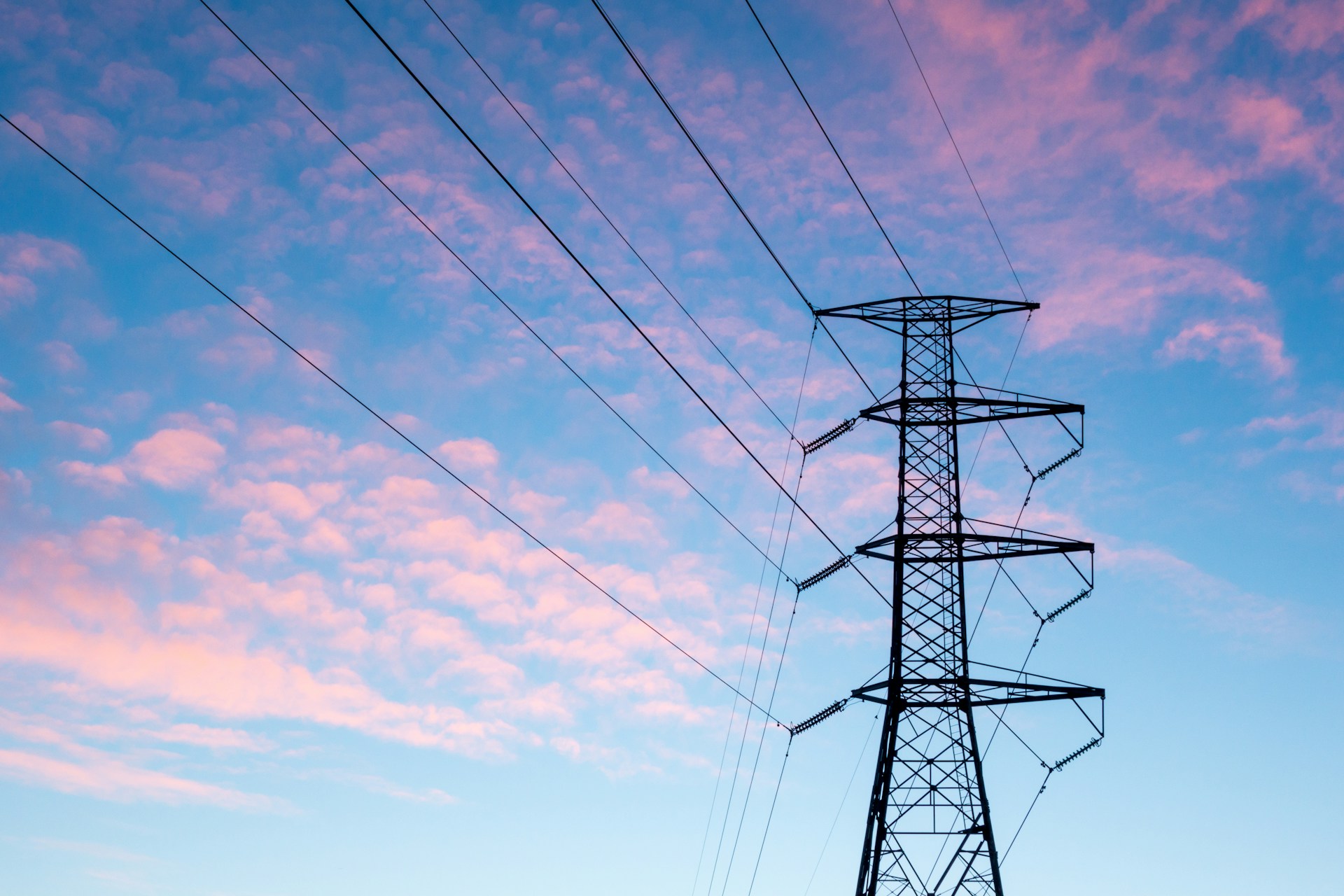 Photo by <a href="https://unsplash.com/@thejohnnyme?utm_source=unsplash&utm_medium=referral&utm_content=creditCopyText">Nikola Johnny Mirkovic</a> on <a href="https://unsplash.com/photos/black-electric-pylon-under-orange-clouds-during-daytime-Z_dnvde5wxc?utm_source=unsplash&utm_medium=referral&utm_content=creditCopyText">Unsplash</a>